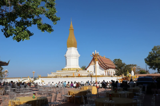  Buddhist Devotees Gather for Alms-Giving at Sikhottabong Festival
